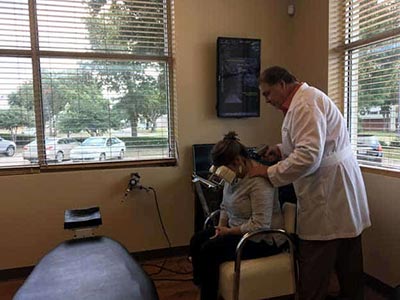 Chiropractor Flower Mound TX Michael Thompson with Patient